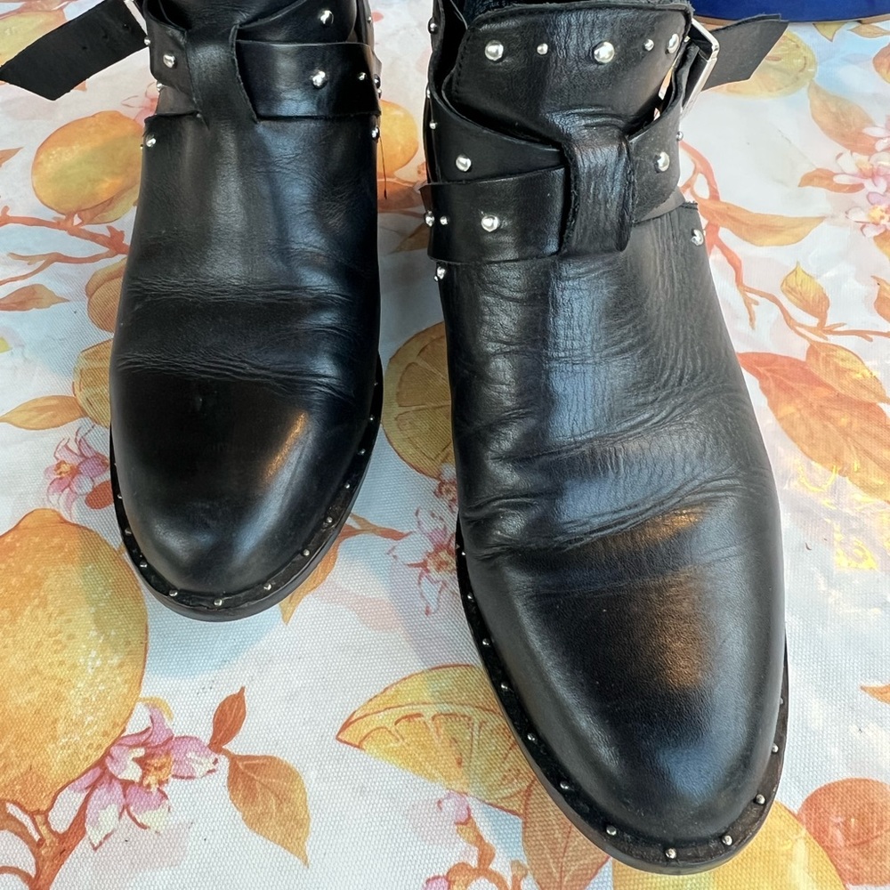Pre own Hailey leather booties .